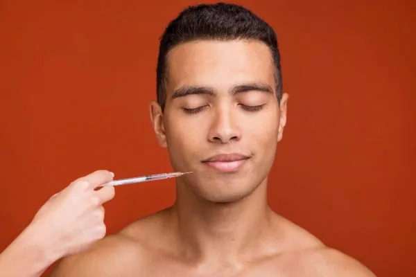 Front view young male with jawline filler