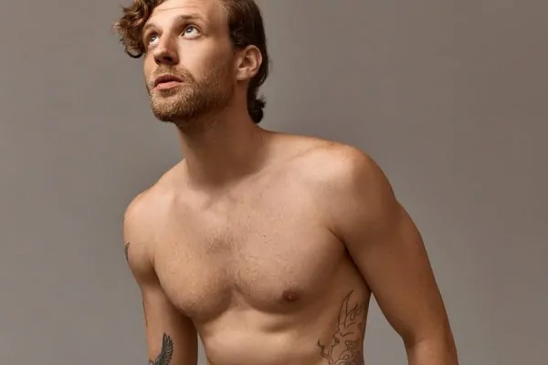 male with athletic torso posing
