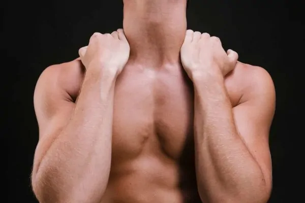 man showing his neck and shoulders