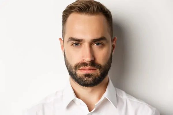 man with lifted face