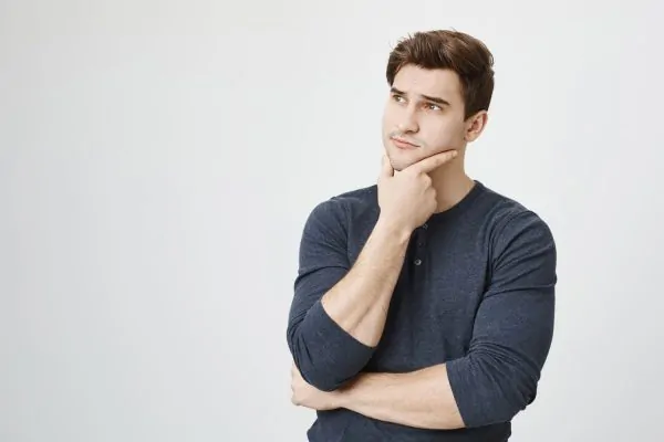 Thoughtful handsome male thinking