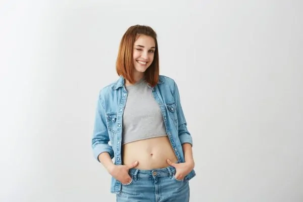 woman being happy with her A Tummy Tuck