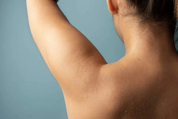 woman with water drops on skin